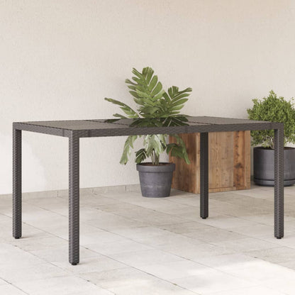 Garden Table with Glass Top Black 150x90x75 cm Poly Rattan